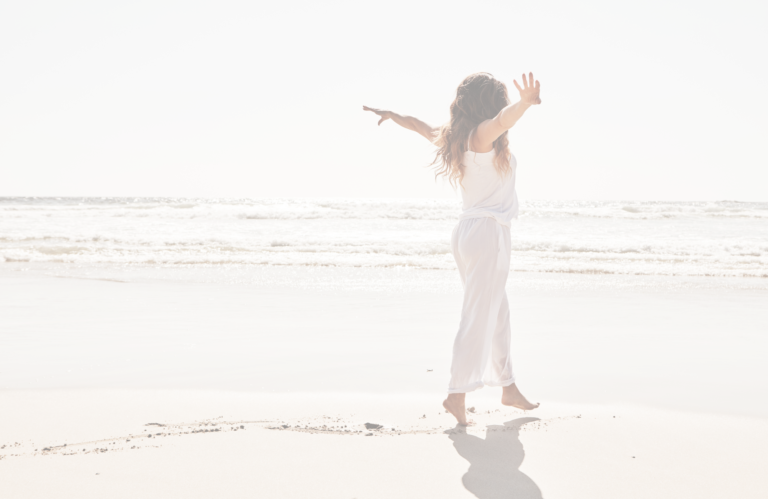 ADHD Woman dancing on sand